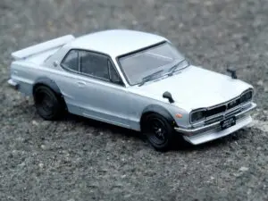 Macheta auto Kaido House Nissan Skyline GT-R R34 Alb 1:64 Mini GT