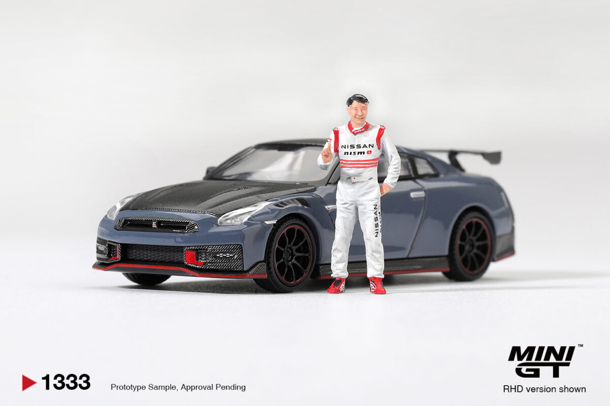 Precomanda macheta auto Nissan Gtr R35 Nismo Tsukuba With Matsuda Figure Tsugio Matsuda 2024 1:64 Mini GT (MGT01333-R)