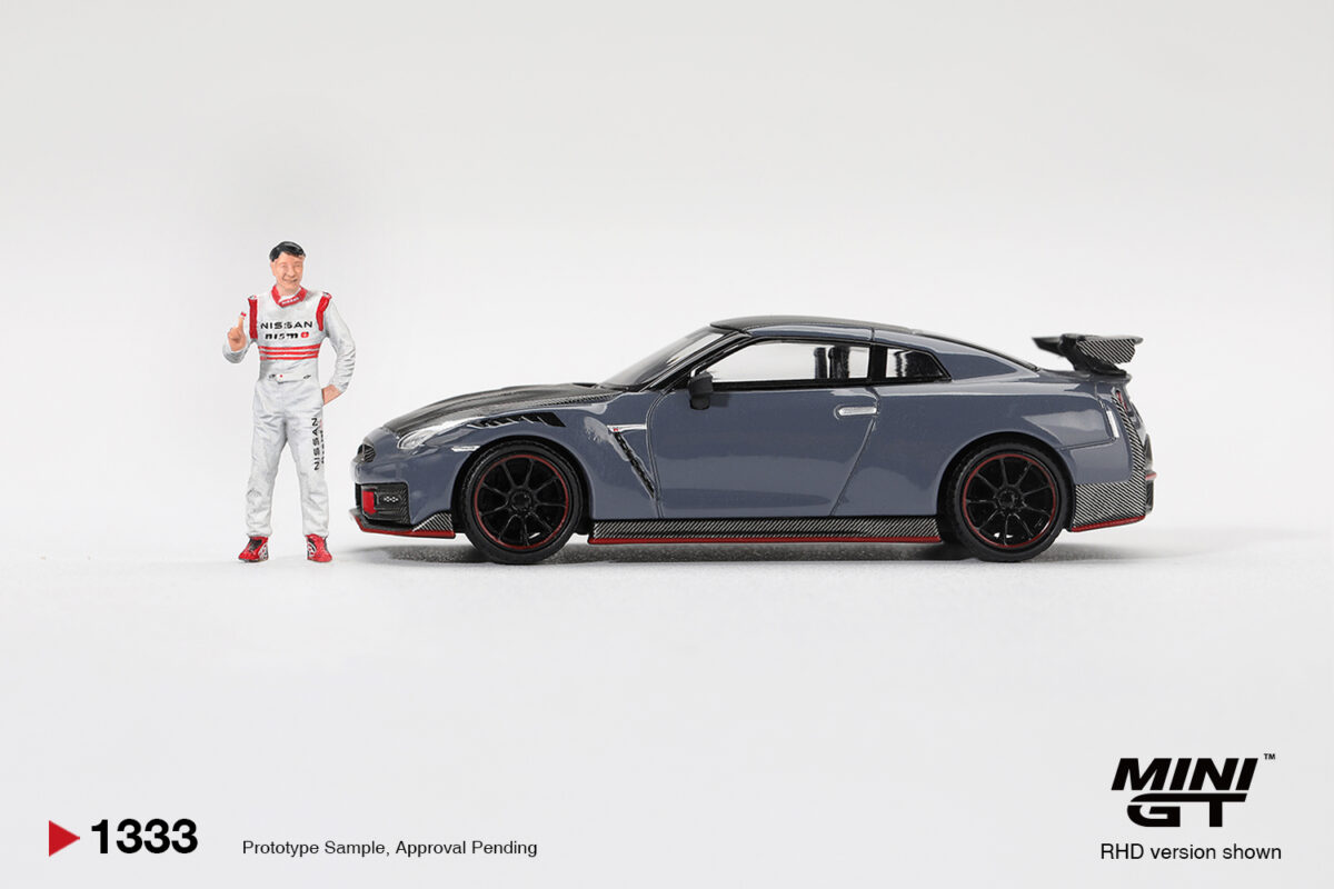 Precomanda macheta auto Nissan Gtr R35 Nismo Tsukuba With Matsuda Figure Tsugio Matsuda 2024 1:64 Mini GT (MGT01333-R) - imagine 3