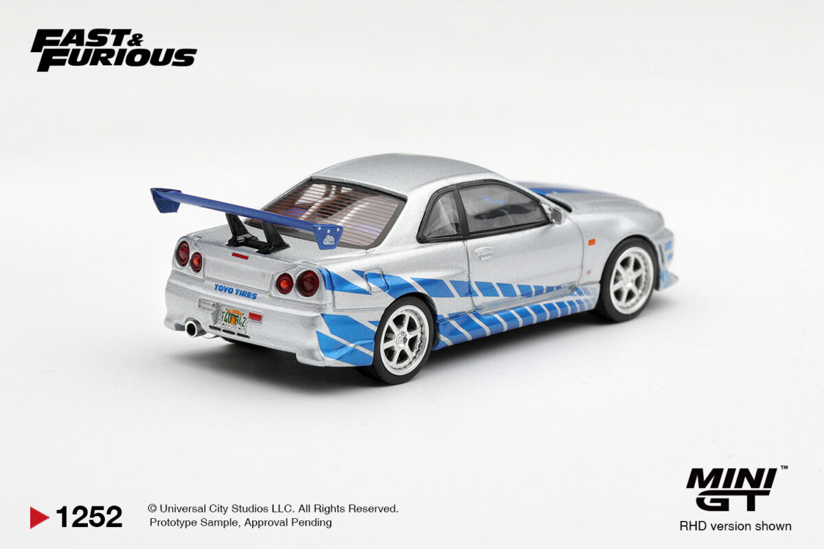 Precomanda macheta auto NISSAN SKYLINE GT-R (R34) C WEST 2 FAST 2 FURIOUS BRIAN O'CONNER (BLISTER PACK) 2003 1:64 Mini GT (MGT01252-BL) - imagine 3